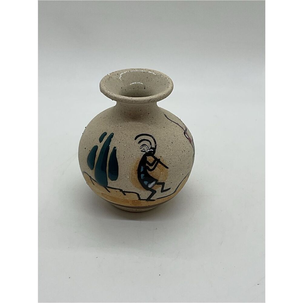 Handcrafted Beige Ceramic Vase with Kokopelli Motif